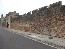 Wall on Cathedral Green Road near Museum of Wells consisting of many types of rock